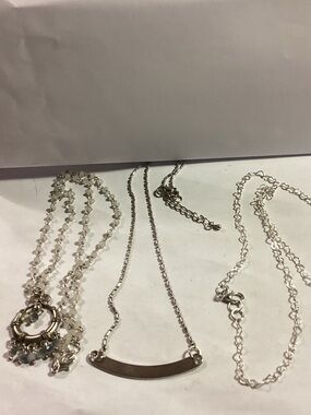 3 silver toned necklaces